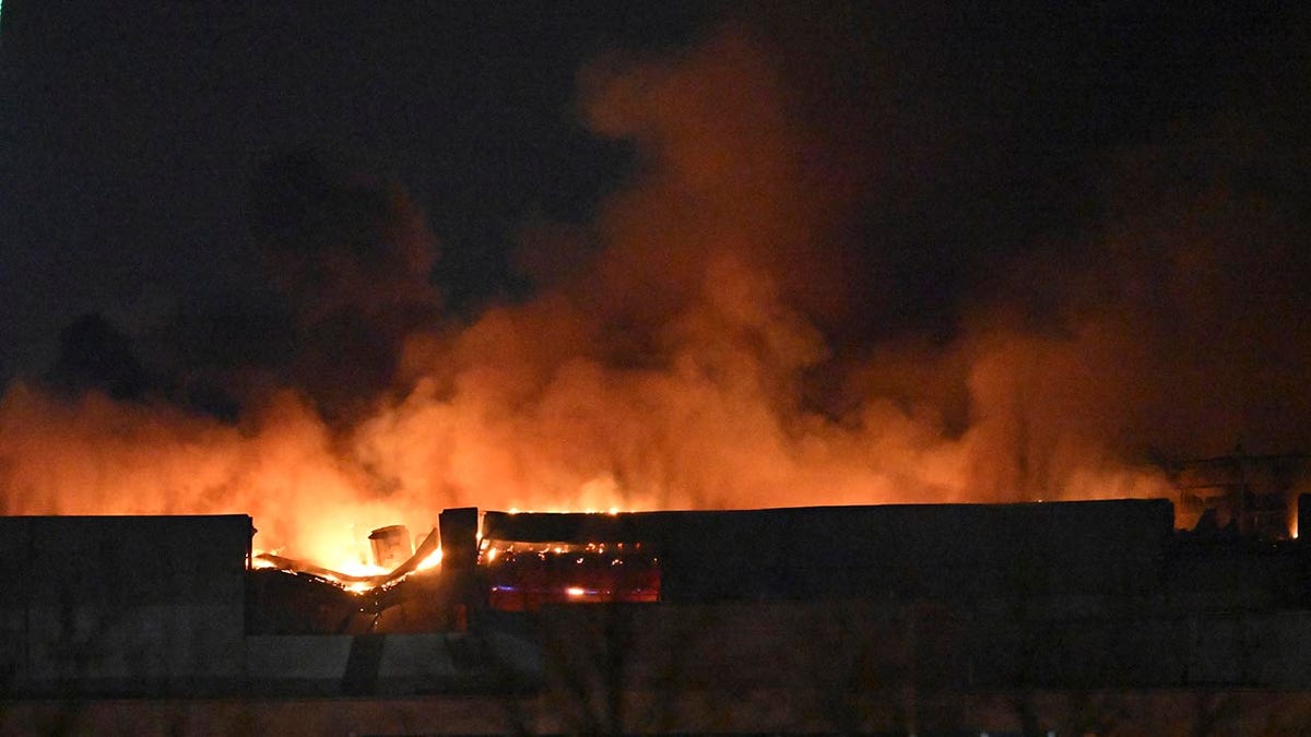 The roof of the concert hall burning