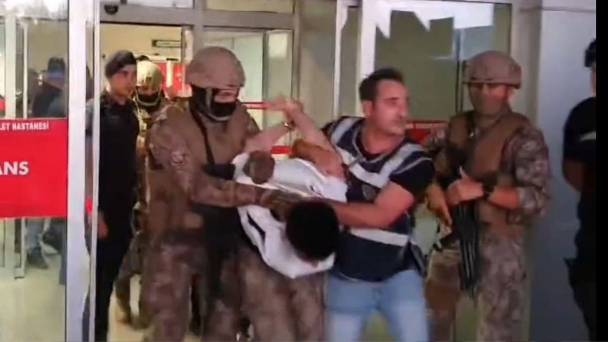 Mosque Neo Nazi attack suspect with police