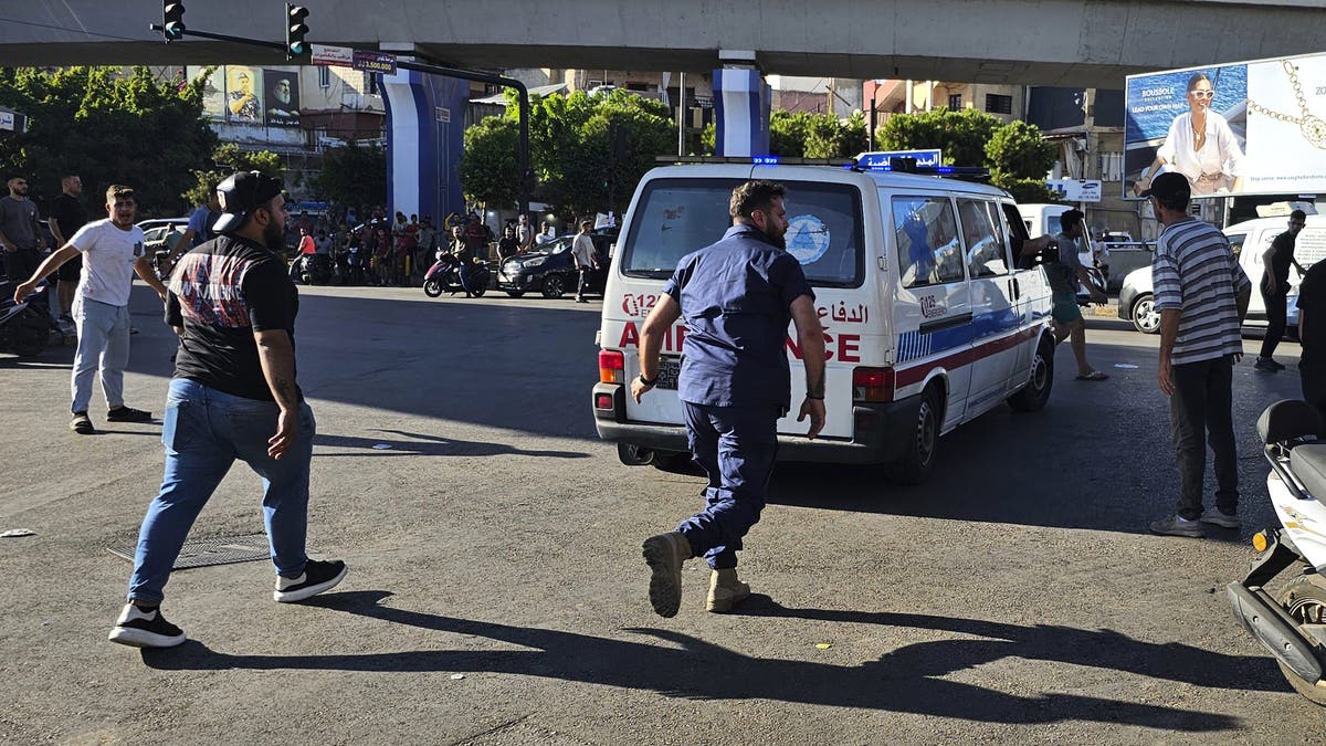 An ambulance carries wounded people whose handheld pager exploded in Beirut on Tuesday.