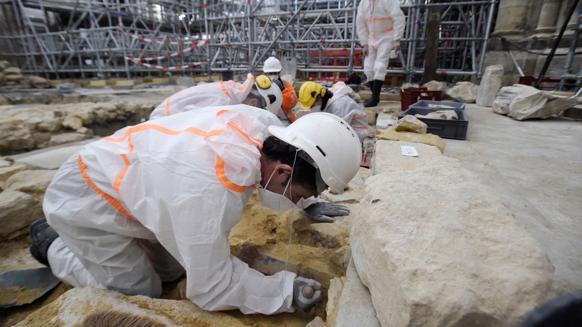 Archaeologists in Notre-Dame Cathedral