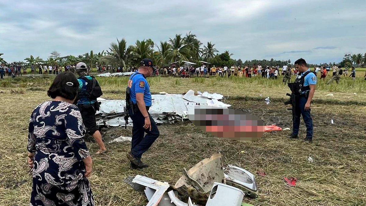 Officials say a U.S. military-contracted plane crashed in a rice field in the southern Philippines, killing all four people on board.