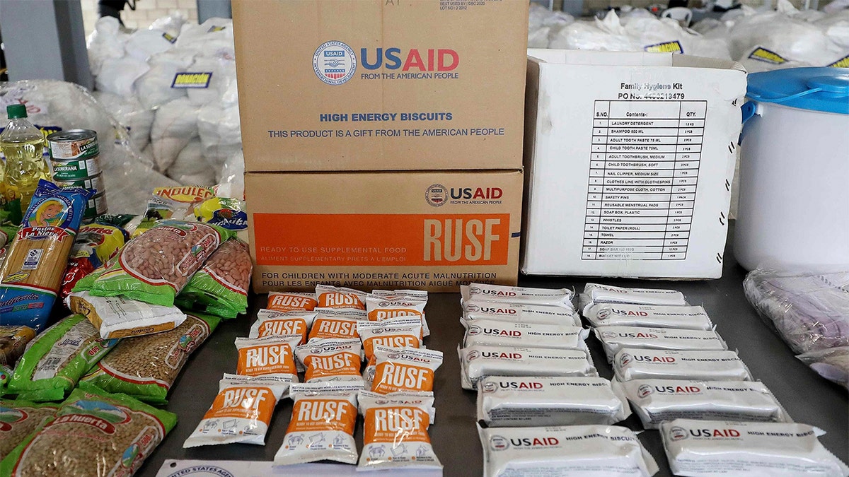 USAID food and supplies displayed at a warehouse