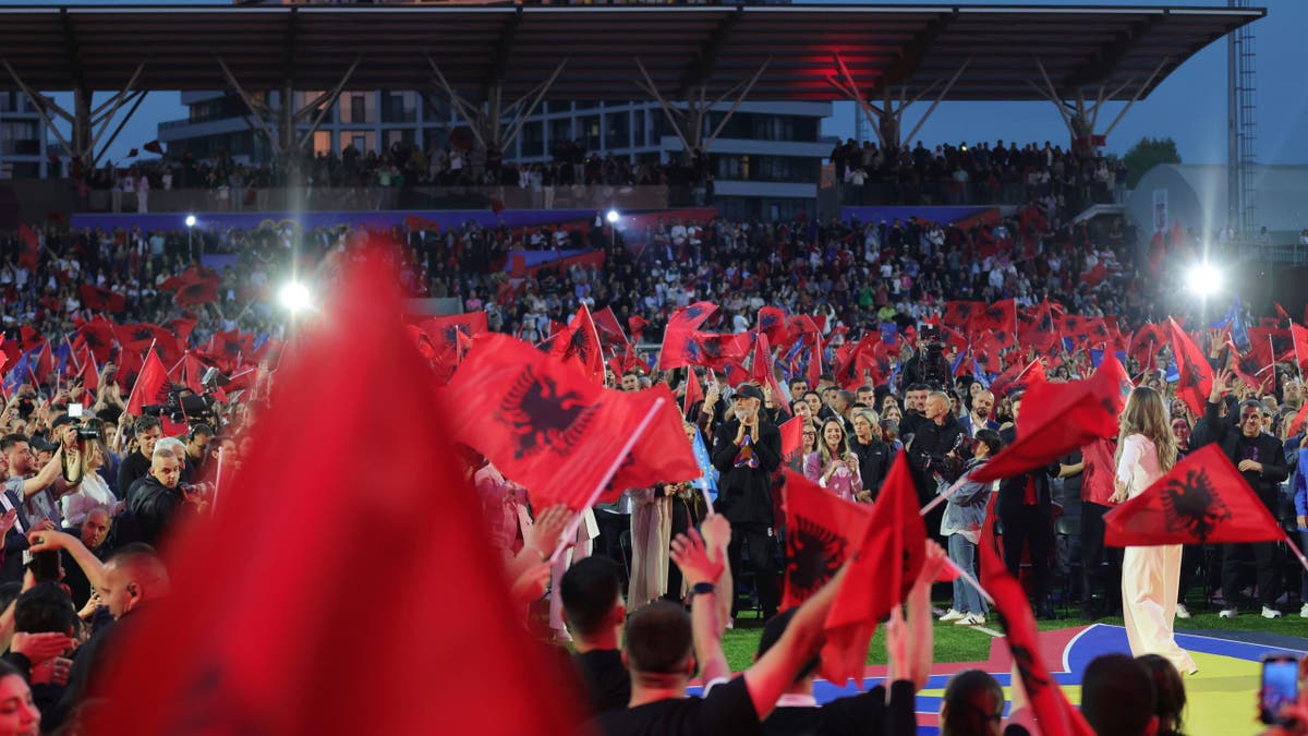 Albania's Prime Minister Edi Rama, center, applauds during his main election campaign rally in Tirana, Albania, Friday, May 9, 2025, as his ruling Socialist Party (PS) seeks a fourth term.