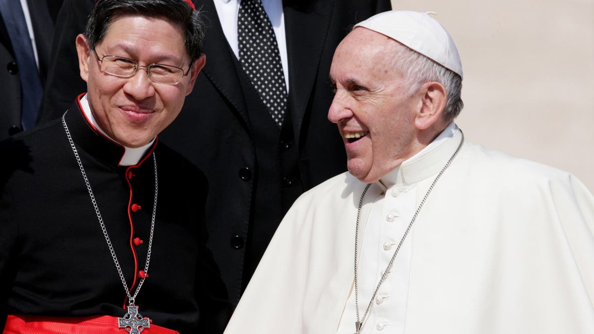 Pope Francis and Luis Antonio Tagle smiling