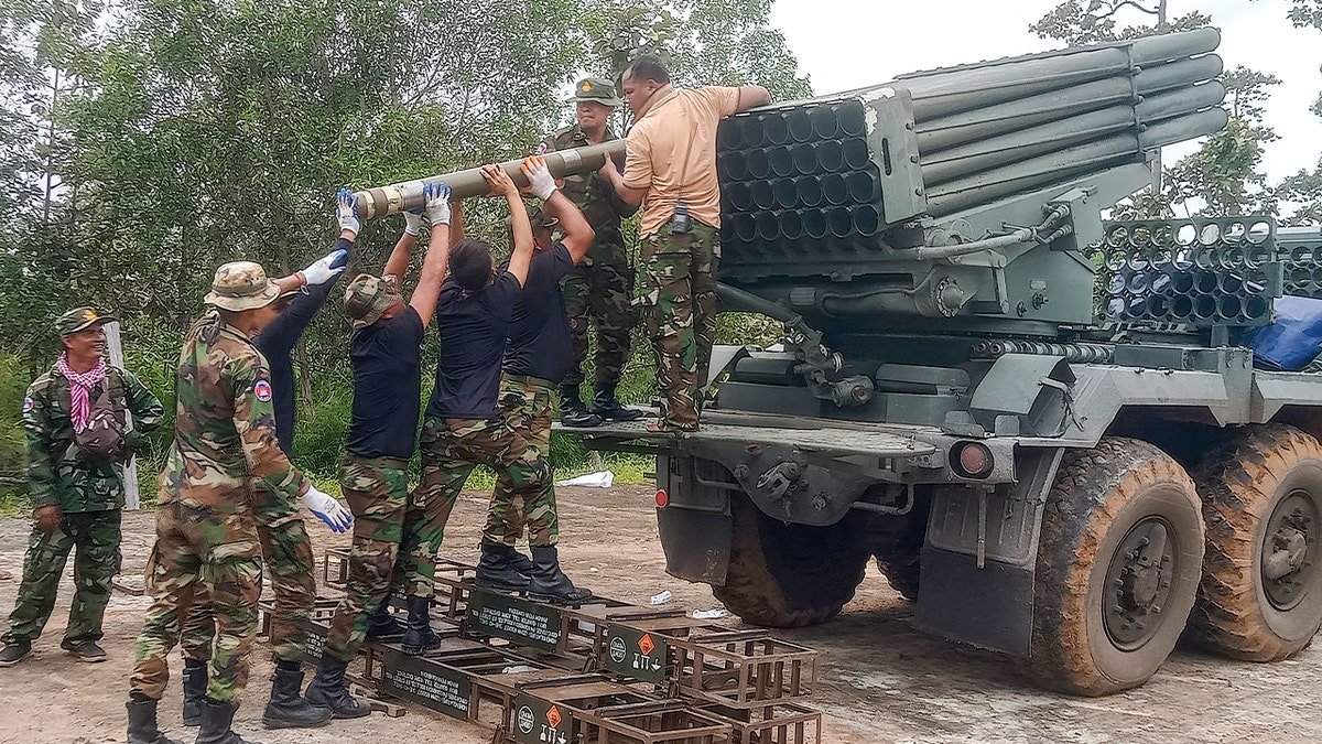 Troops from Cambodia reload BM-21 amid border clashes with Thailand