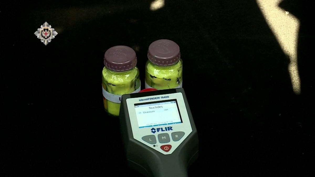 two bottles of yellow uranium