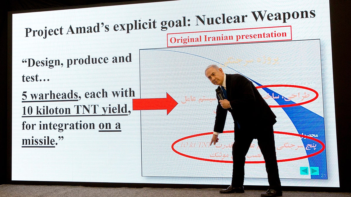 Israeli Prime Minister Benjamin Netanyahu shows part of Iran's nuclear archive to reporters.