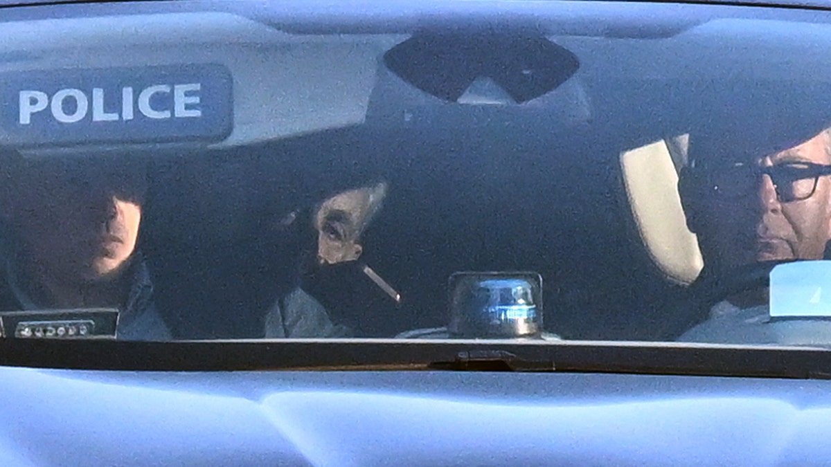 Nicolas Sarkozy in a car
