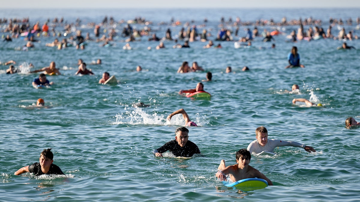 Surfers return to Bondi Beach