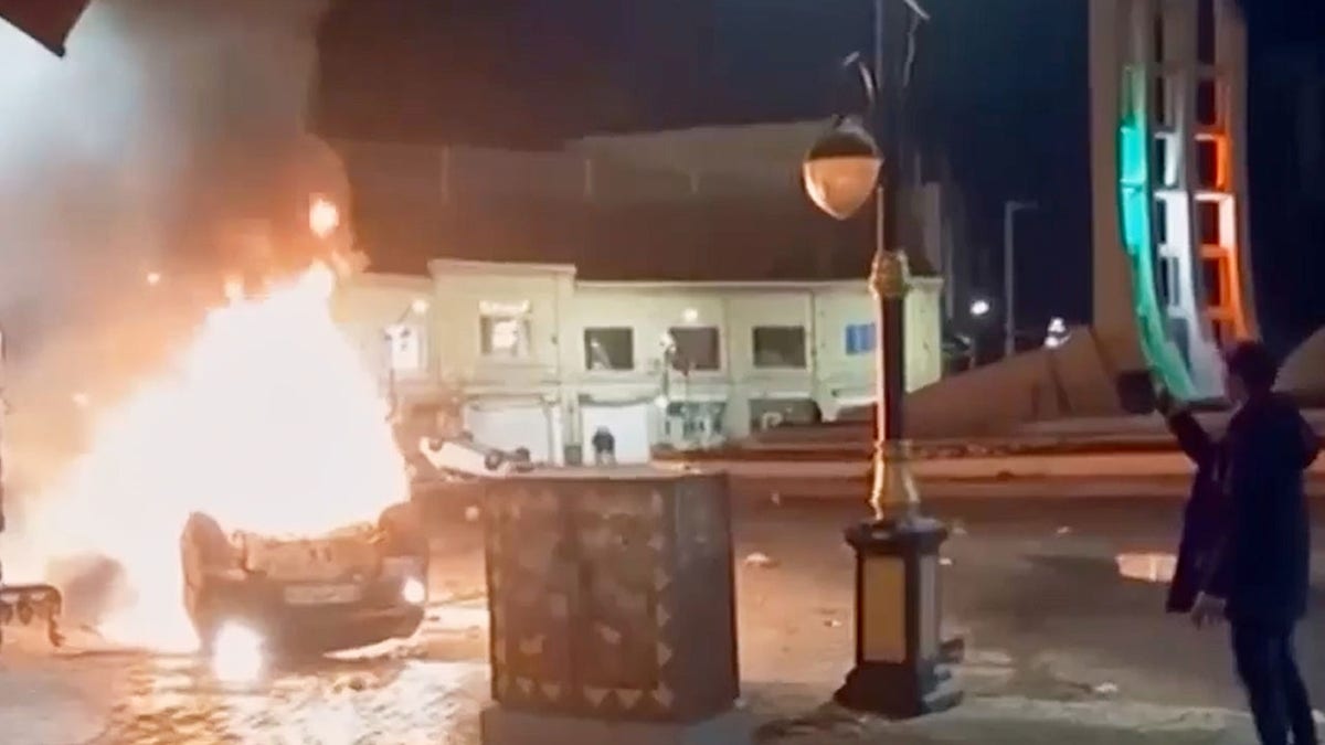 Car on fire in Tehran