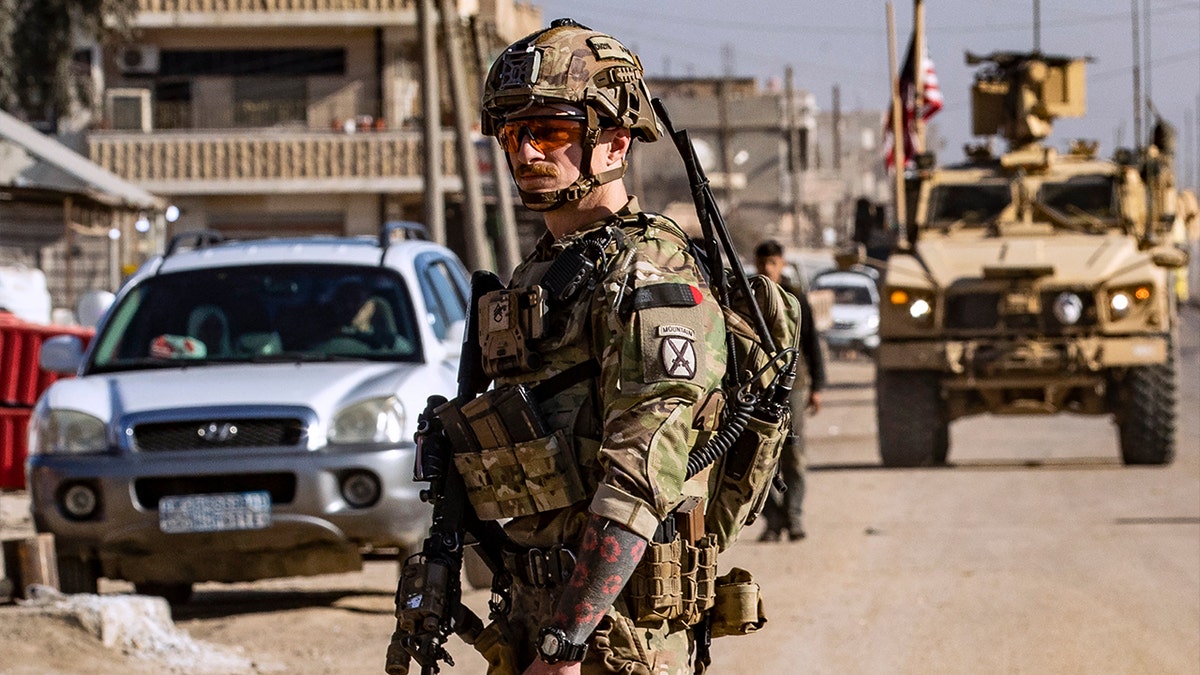 US soldiers patrol in Syria's northeastern city Qamishli, in the Hasakeh province, mostly controlled by Kurdish-led Syrian Democratic Forces (SDF), on January 9, 2025.