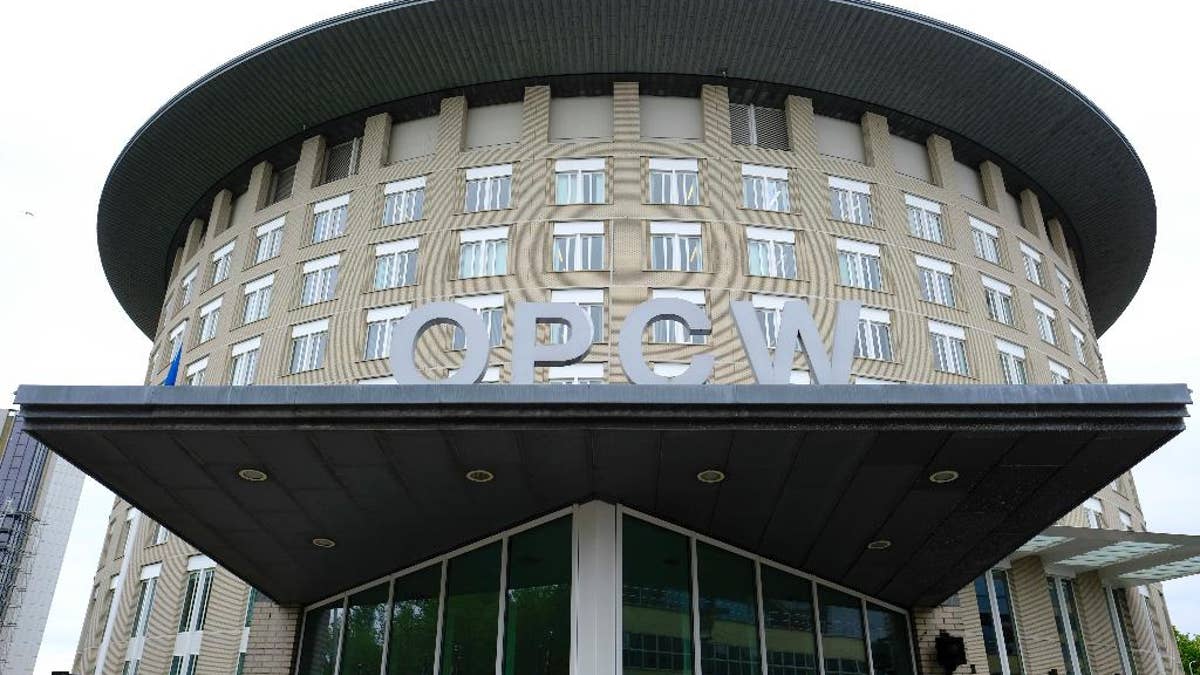 Exterior view of the headquarters of the Organization for the Prohibition of Chemical Weapons, OPCW, in The Hague, Netherlands, Friday, May 5, 2017. (AP Photo/Peter Dejong)