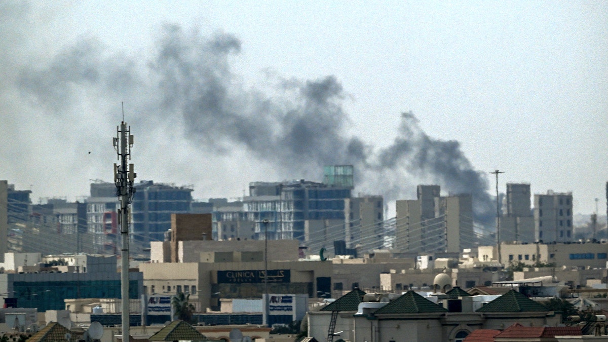 Smokie rises over Doha, Qatar