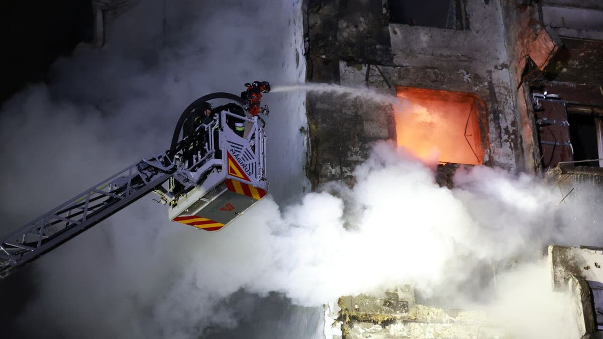 Firefighters battle blaze at apartment building hit by Russian drone in Zaporizhzhia
