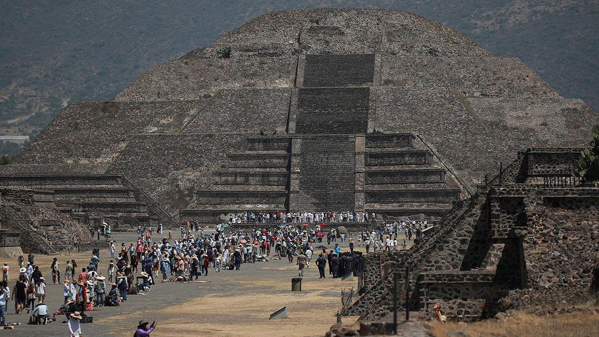 People visiting the Pyramid of the Sun at Teotihuacan near Mexico City