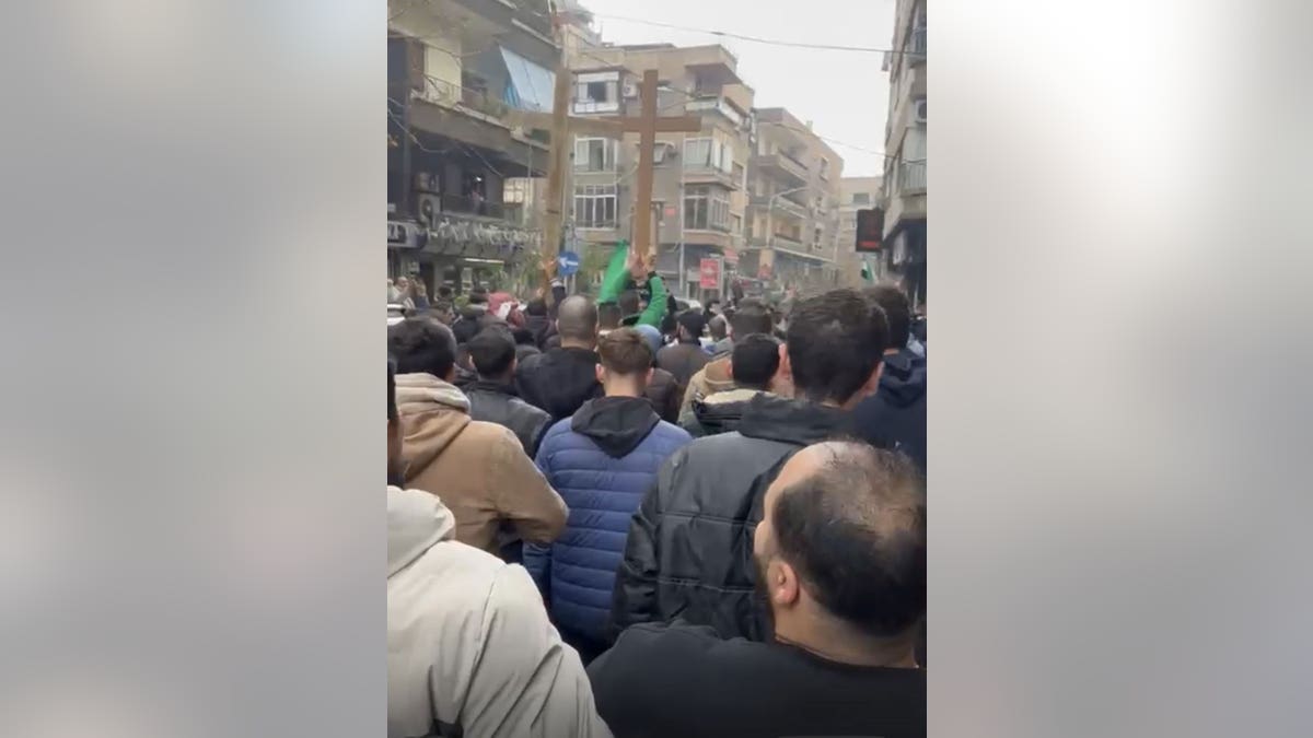 Eagles of Antioch protesters marching in Damascus streets