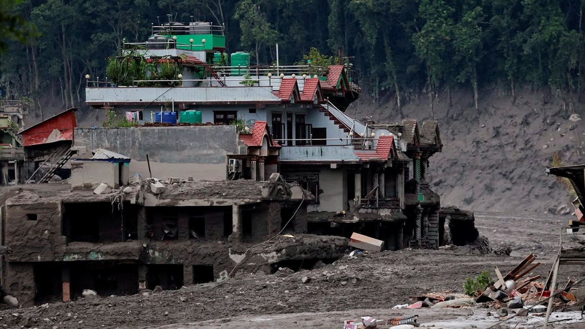 Damaged houses following a flash flood at Trishuli in Nuwakot district, Nepal, August 26, 2026.
