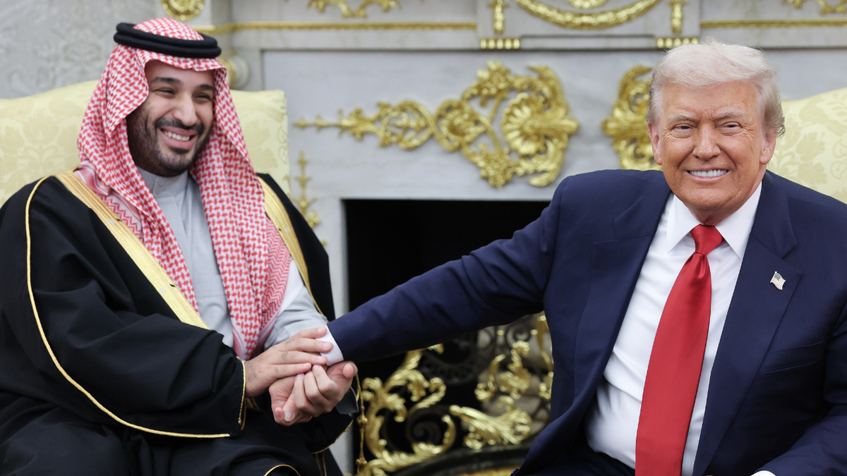 U.S. President Donald Trump smiles with Crown Prince and Prime Minister Mohammed bin Salman of Saudi Arabia during a bilateral meeting in the Oval Office.