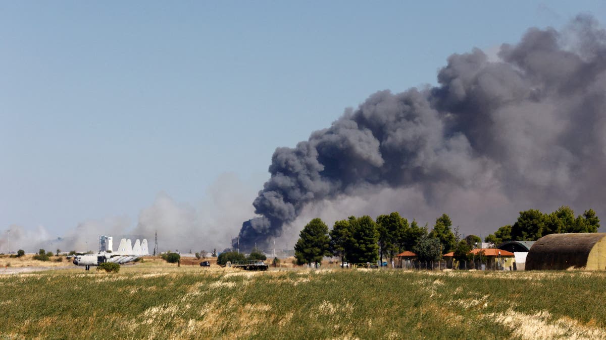 Smoke rises following a Greek F-4 Phantom fighter jet crash in Tanagra, Greece.