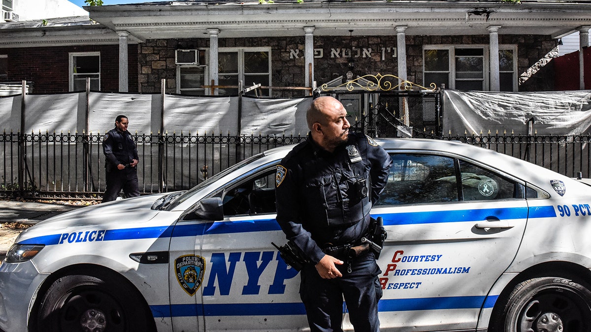 NYPD security outside synagogue in Brooklyn.