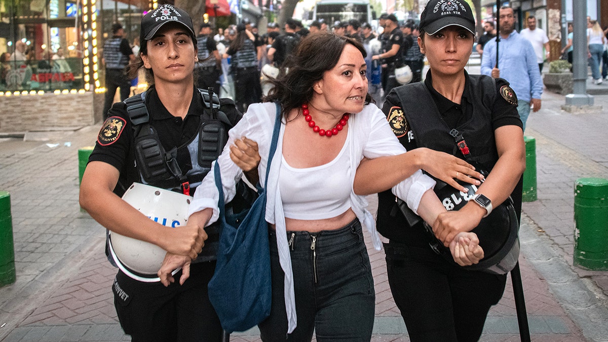 Turkish authorities crackdown on LGBT activists.
