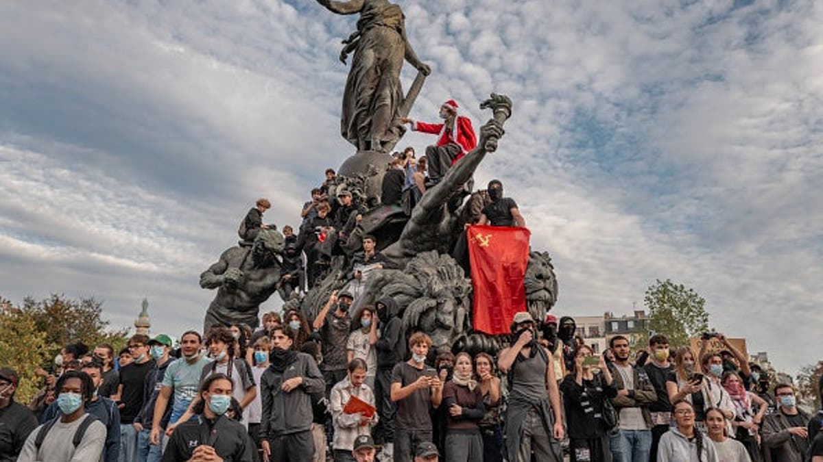 Protestors gather around the Monument à la République during Paris student protests on Oct. 4, 2026.