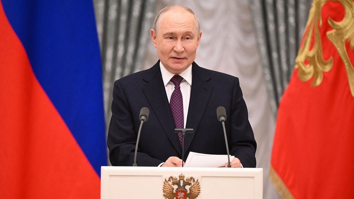 Vladimir Putin hosts a state awards ceremony at the Kremlin in Moscow.