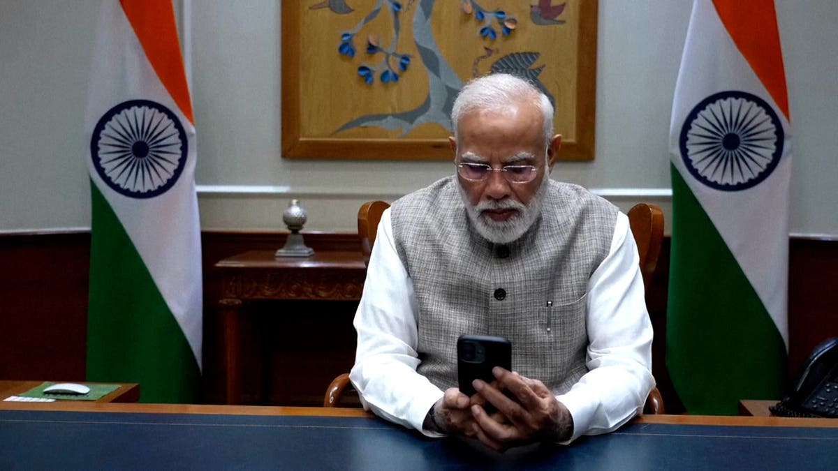 Indian Prime Minister Narenda Modi speaks to FlyDubai pilot Capt. Smit Machchhar during an Oct. 2, 2026 phone call