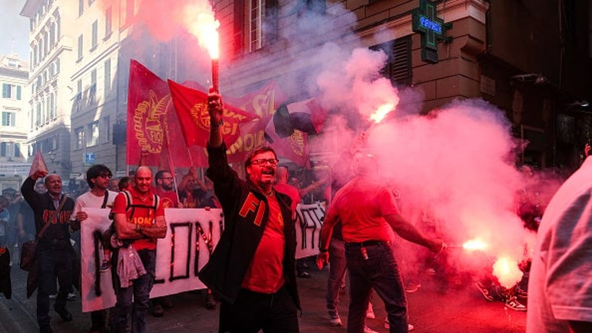 A rally reaches the city center in Genoa, Italy, with tens of thousands of protesters on Oct. 3, 2025. Despite the Commission for the Guarantee declaring the strike illegitimate for lack of proper notice, dockworkers, students and civil society are gathering at the Port of Genoa for an anti-Israel demonstration with the Global Sumud Flotilla.