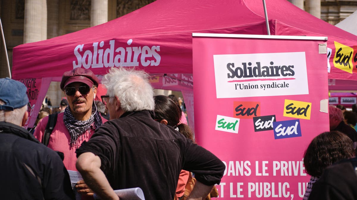 Solidaires union booth at an anti-fascist rally in Place du Pantheon, Paris.
